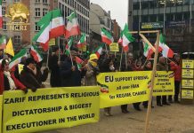Einladung von Zarif inmitten der Auseinandersetzungen mit iranischen Demonstranten für Freiheit und Demokratie